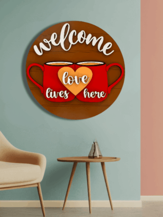 Welcome Love Lives Here wooden wall decor displayed in a modern living room interior