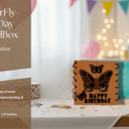 Vertical handcrafted butterfly birthday card with bold typography and butterfly motifs, placed on a wooden surface