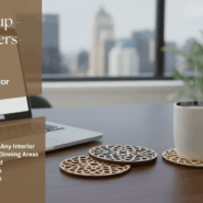 Text: Set of handmade wooden tea coasters with colorful geometric cutouts placed beside cups of coffee