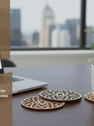 Text: Set of handmade wooden tea coasters with colorful geometric cutouts placed beside cups of coffee