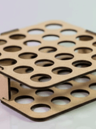 Wooden cosmetic rack holding various lipsticks and glosses in a dark, luxury boudoir setting with wood-paneled shelving.