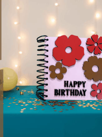 Wooden floral birthday card gift with balloons and decorative birthday setup