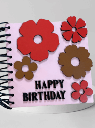 Handcrafted wooden floral birthday card with spiral binding and happy birthday text